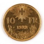 A Swiss 1922 ten francs gold coin.