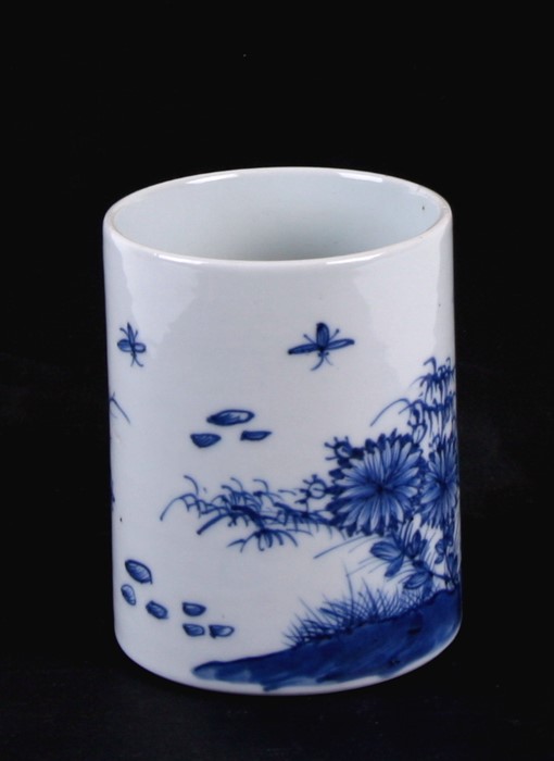 A Chinese blue & white bitong brush pot decorated with flowers and insects, 12cms (4.75ins) high. - Image 2 of 3