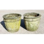 A pair of well weathered reconstituted stone garden planters, 31cms (12.25ins) high (2).