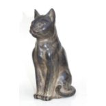 A bronze figure of a seated cat, 24cms (9.5ins) high.