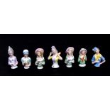 Seven porcelain half dolls, the tallest 6cms (2.5ins) high (7).