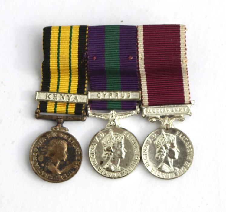 A mounted miniature medal group consisting of the Africa General Service Medal with Kenya clasp, a