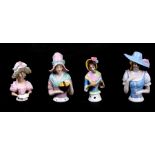 A porcelain half doll pin cushion of a lady wearing a pink and blue dress holding a fan, 10.5cms (