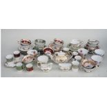 A quantity of assorted Paragon and Limoges tea and coffee wares to include coffee cans and cabinet