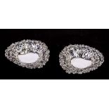 A pair of Victorian silver bonbon dishes with pierced and repousse decoration, Birmingham 1898,