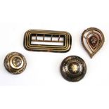 Three 19th century pique gold and silver inlaid brooches; together with a large pique buckle (4).