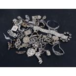 A quantity of diamante style jewellery to include necklaces, brooches and bracelets.