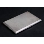 A silver cigarette case with engine turned decoration, London 1946, weight 196g, 12cms (4.75ins)