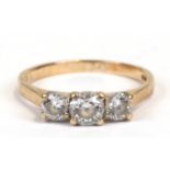 A 9ct gold three-stone ring (not diamonds), approx UK size 'O'.