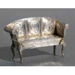 A Victorian novelty miniature silver sofa with repousse decoration, John George Smith, London
