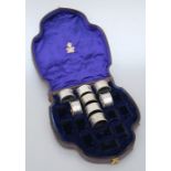 Eight Elkington silver plated napkin rings, boxed.Condition Report Would originally have been a