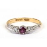 An 18ct gold diamond and ruby ring, approx UK size 'M'.Condition ReportGood overall condition