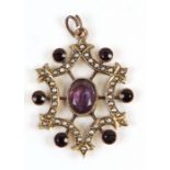 A late 19th / early 20th century 9ct gold amethyst and seed pearl pendant, 3cms (1.2ins) high.