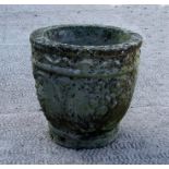 A well weathered reconstituted stone garden planter, 30cms (12ins) high.