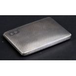 A silver cigarette case with engine turned decoration and initialled 'ED', Birmingham 1928, weight