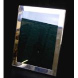 A silver rectangular strut phot frame, Birmingham 1970, 22cms (8.5ins) wide.