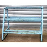 A three-tier blue painted potting shed rack, 164cms (64.5ins) wide.