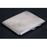 A silver cigarette case with engine turned decoration, Birmingham 1941, weight 127g, 9.5cms (3.