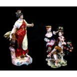A 19th century Derby figure depicting a robed lady standing beside an eagle, 18cms (7ins) high;