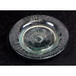 A late Venetian glass dish, engraved with a twin masted sailing ship, 15cms (6ins) diameter.