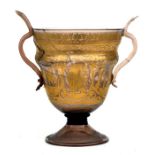 A Venetian gilded glass two-handled pedestal bowl decorated with classical scenes, 19cms (7.5ins)