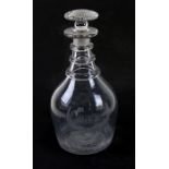 A 19th century glass mallet shaped decanter with acid etched decoration, 30cms (12ins) high.