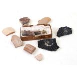 A quantity of Roman pottery fragments and other items.