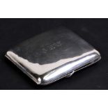 A silver cigarette case initialled 'JNW', Chester 1919, weight 105g, 9cms (3.5ins) wide.
