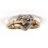 A 9ct gold diamond set buckle ring, approx UK size 'N'.