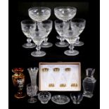 A pair of Waterford Crystal champagne glasses; together with a set of six French St Louis Crystal