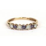 A 9ct gold amethyst and white stone dress ring, approx UK size 'T'.