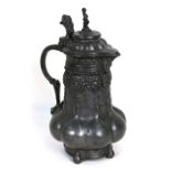 A large Orivit pewter lidded jug, 31cms (12.25ins) high.