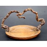 A fruitwood basket with rootwood handle, 30cms (12ins) diameter.