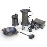 A large pewter lidded jug; together with a pewter lidded tankard; a pewter box; miniature pewter
