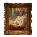 Sylvia Drugeon - a half length portrait of a seated lady within an interior, oil on board, signed to