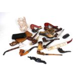 A quantity of pipes to include Meerschaum examples.