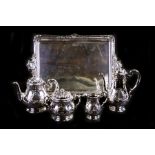 A Christofle Orfevrerie Gallia four-piece silver plated tea and coffee set on a two-handled tray.