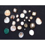 A quantity of loose and mounted cameos, the largest 5cms (2ins) high.