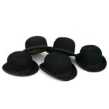 A group of five bowler hats to include Locke & Co., and Dunn & Co (5).Condition ReportDunn & Co 7.