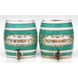 A pair of spirit barrels 'S.Whisky' and 'Brandy', 27cms (10.5ins) high (2).