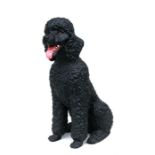 A plastic model of a black poodle, 67cms (26.5ins) high.