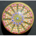 A millefiore paperweight, 7.5cms (3ins) diameter.