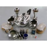 A quantity of silver and sliver plated items to include a pair of silver backed hair brushes,