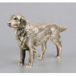 A silver gilt cast figure in the form of a Retriever dog, Birmingham 1972, weight 400g, 15cms (6ins)