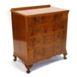 A reproduction burr walnut chest of four graduated long drawers, on dwarf cabriole legs, 79cms (