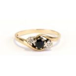 A 9ct gold and sapphire cross-over dress ring, approx UK size 'R'.Condition Reportgeneral wear,