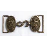 An early 20th century Royal Navy officers white metal belt buckle with snake clasp. Overall width