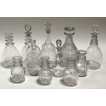 An early 19th century decanter etched 'Cyder', 29cms (11.5ins) high; together with similar 19th