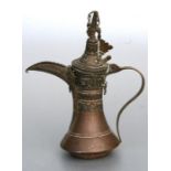 A Turkish / Islamic copper dallah coffee pot, 19cms (7.5ins) high.