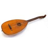 A mandolin with segmented barrel back, 95cms (37.5ins) long.